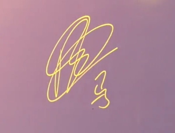 奇异果体育app-国安德籍经理马永明出席中国金球奖颁奖仪式，并在签名墙书写马字